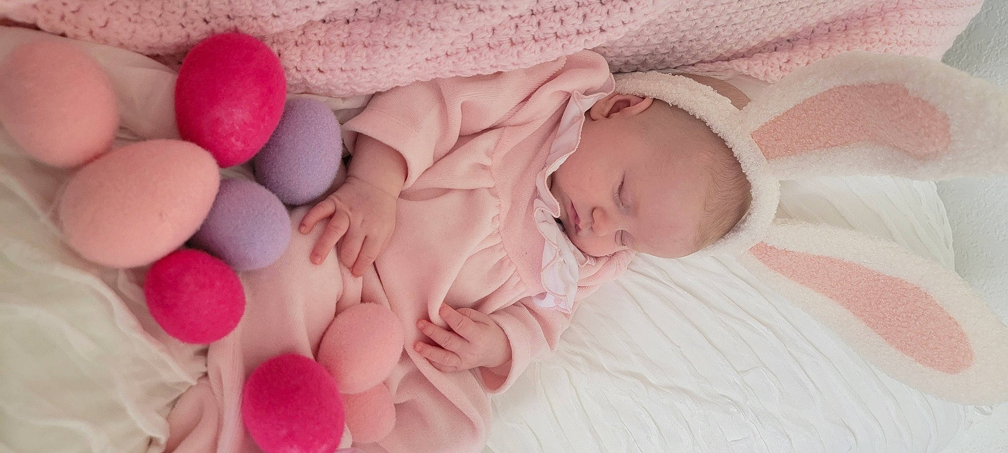 Chloe joined the competition — help win amazing prizes! baby, baby_sleeping, baby_toddler_clothing, cheek, child, close_up, comfort, eye, face, finger, hair, hand, head, human_body, linens, magenta, person, pink, skin, textile