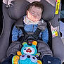 baby, infant, child, car_seat, car, sleeping, toy, plush_toy, socks, bib, denim_jacket, safety_harness, seat_belt, airbag_label, sunlight, shadow, rear_facing, cute, napping, portrait