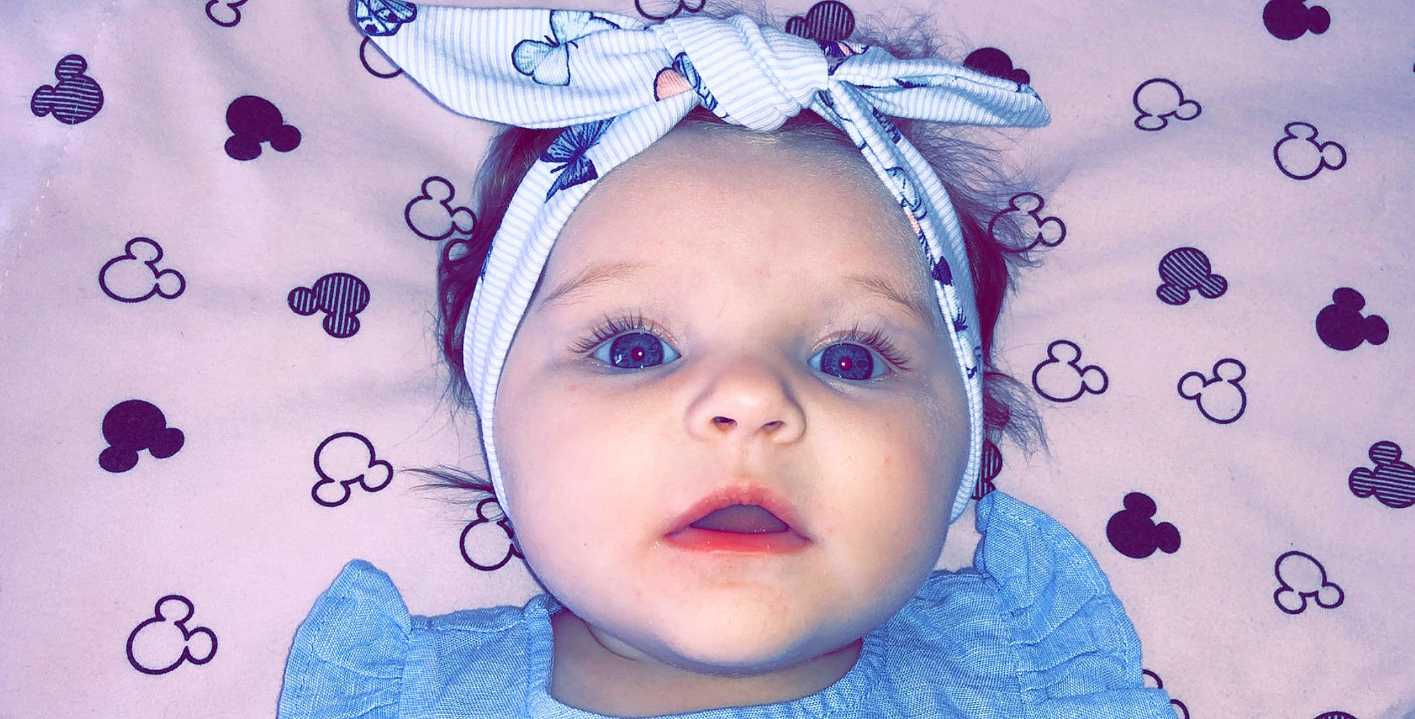 Chelby a rejoint le concours — aidez-le/la à gagner de superbes lots ! baby, cheek, child, ear, eye, eyebrow, eyelash, face, forehead, hair_accessory, head, headgear, headwear, lavender, lip, nose, person, photography, purple, smile