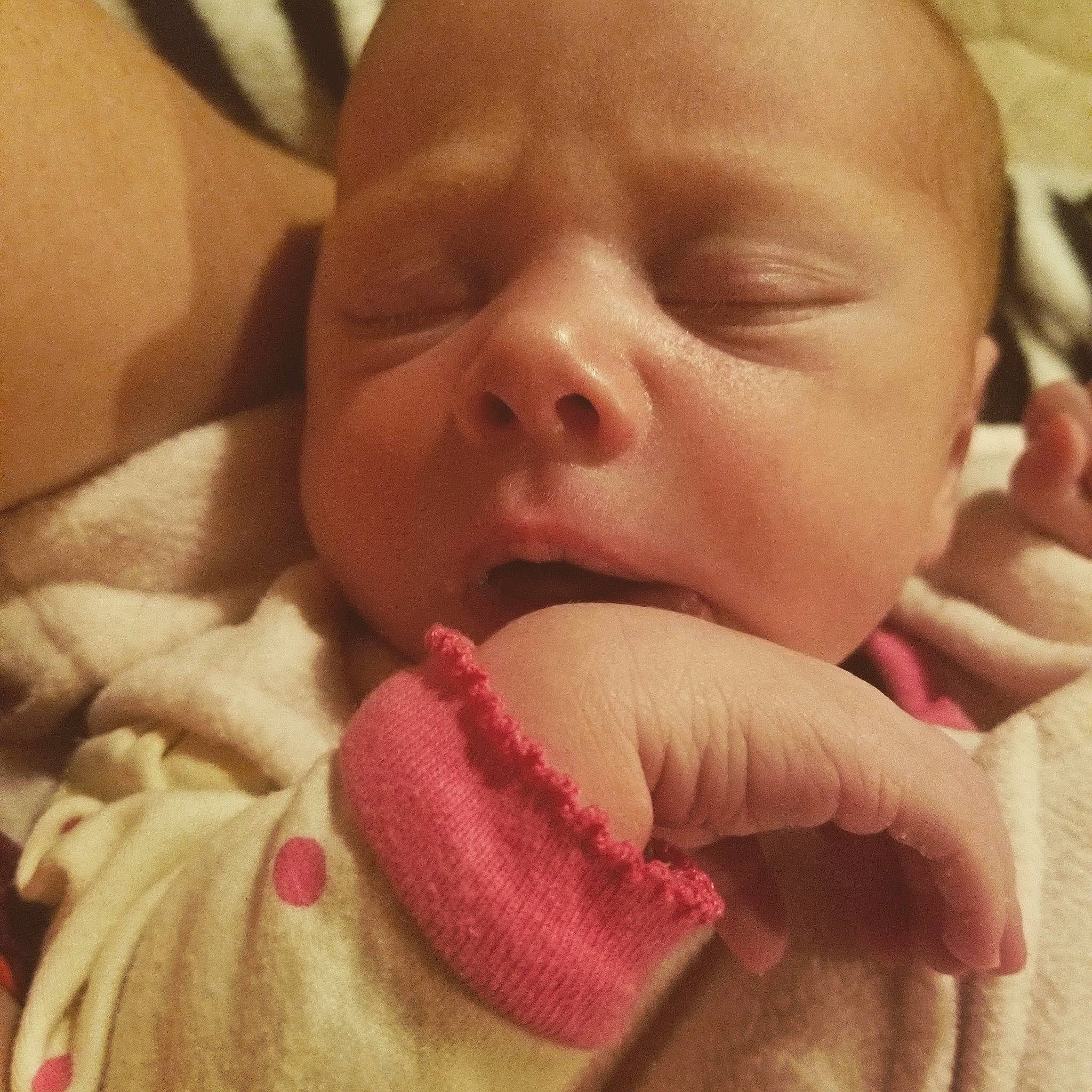 Olivia is registered to the contest to win money with this photo: baby, baby_making_funny_faces, beauty, birth, cheek, child, close_up, eye, face, finger, hand, head, lip, mouth, nose, person, pink, skin, sleep, thumb