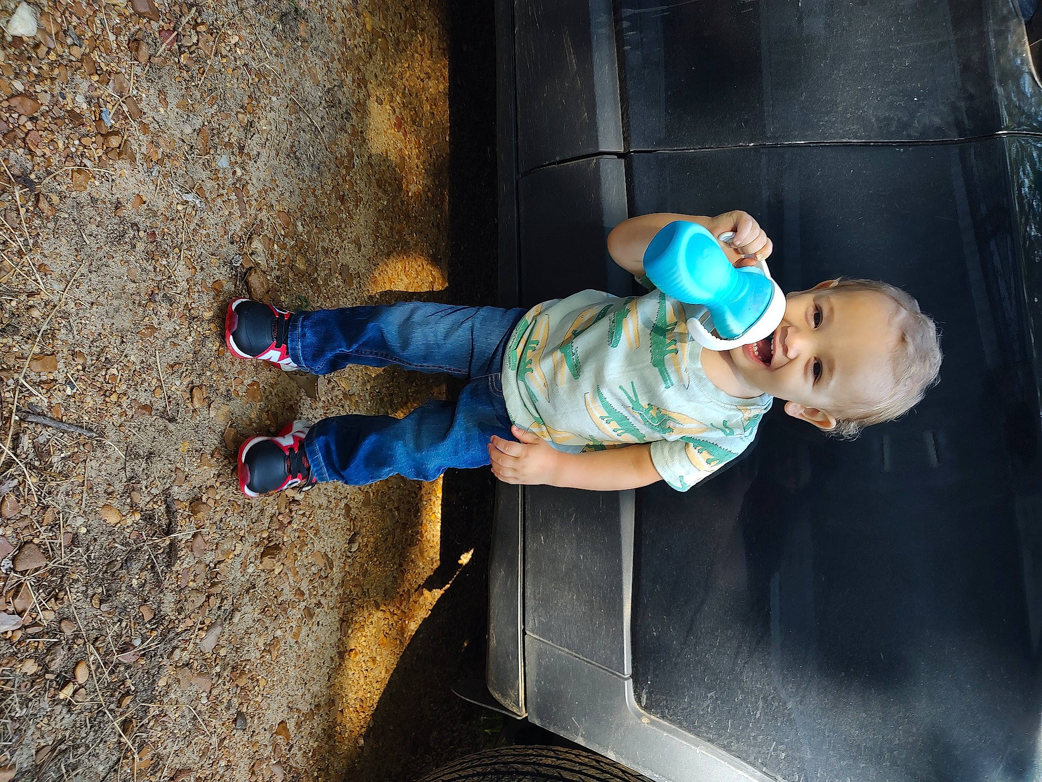 Briar joined the competition — help win amazing prizes! baby, baby_toddler_clothing, child, concrete, denim, electric_blue, fun, grass, hat, human_leg, person, public_space, shadow, sitting, sneakers, soil, standing, toddler, walking_shoe