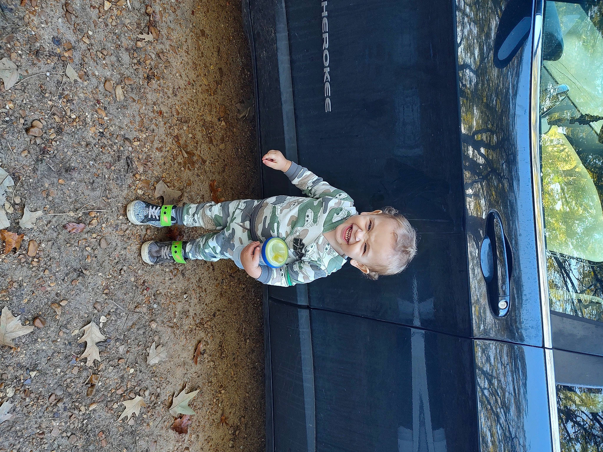 Briar joined the competition — help win amazing prizes! asphalt, baby, city, concrete, fun, joy, leisure, person, plant, road_surface, shadow, sidewalk, soil, toddler, tree, walking_shoe