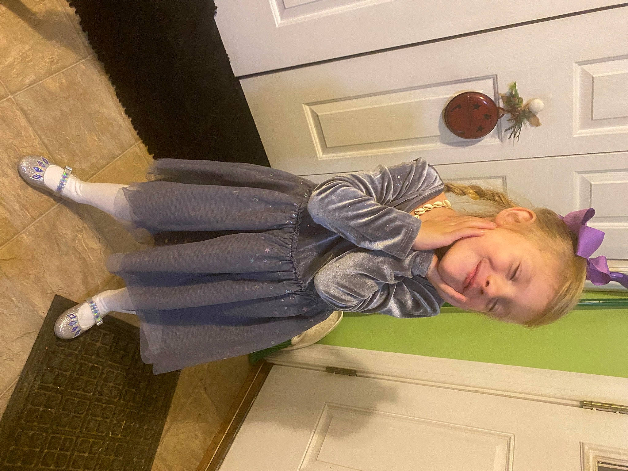 Ivy Rose is registered to the contest to win money with this photo: ball, child, comfort, flooring, foot, fun, hardwood, human_leg, jacket, joy, knee, laundry_room, person, room, smile, sock, sportswear, thigh, toddler, walking_shoe