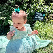 Everleigh is registered to the contest to win money with this photo: toddler, child, bubble, greenery, outdoor, dress, bow, sunlight, grass, curious, nature, baby, playful, portrait, garden, summer, young_child, sitting, innocence, daylight