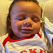 Scheffen joined the competition — help win amazing prizes! baby, smiling, sleeping, mickey, clothing, blanket, indoor, bed, cute, infant, person, face, head, toddler, comfort, cozy, soft, warm, resting, young_child