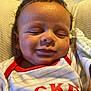 baby, smiling, sleeping, mickey, clothing, blanket, indoor, bed, cute, infant, person, face, head, toddler, comfort, cozy, soft, warm, resting, young_child