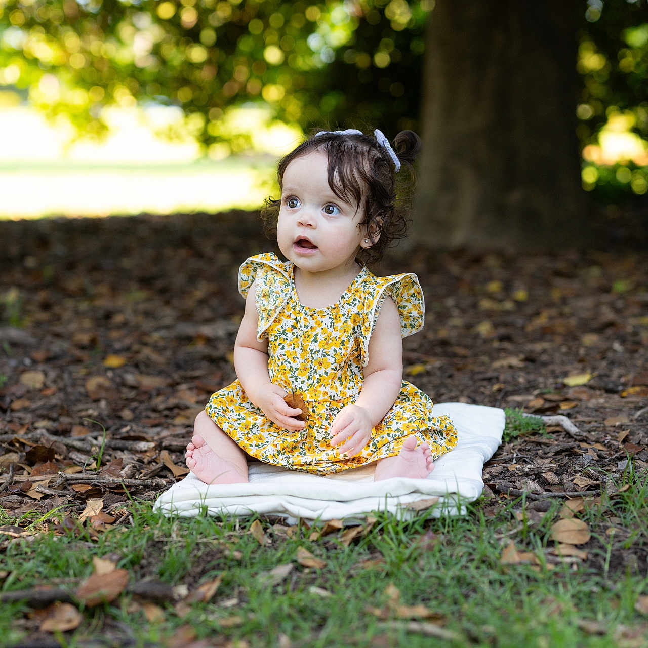 Finland joined the competition — help win amazing prizes! baby, bodypart, clothing, dress, face, finger, formalwear, grass, hand, happy, head, lawn, leaf, person, photography, plant, portrait, sitting, soil, tree