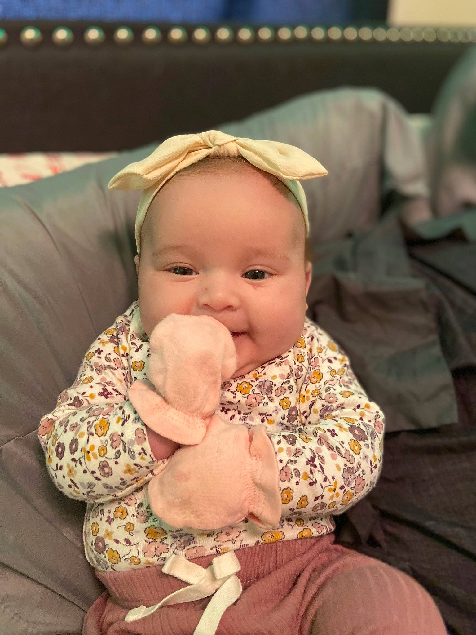 Adriana is registered to the contest to win money with this photo: abdomen, baby, baby_toddler_clothing, cheek, child, chin, comfort, fun, happy, iris, lap, person, portrait_photography, sitting, skin, smile, thumb, toddler