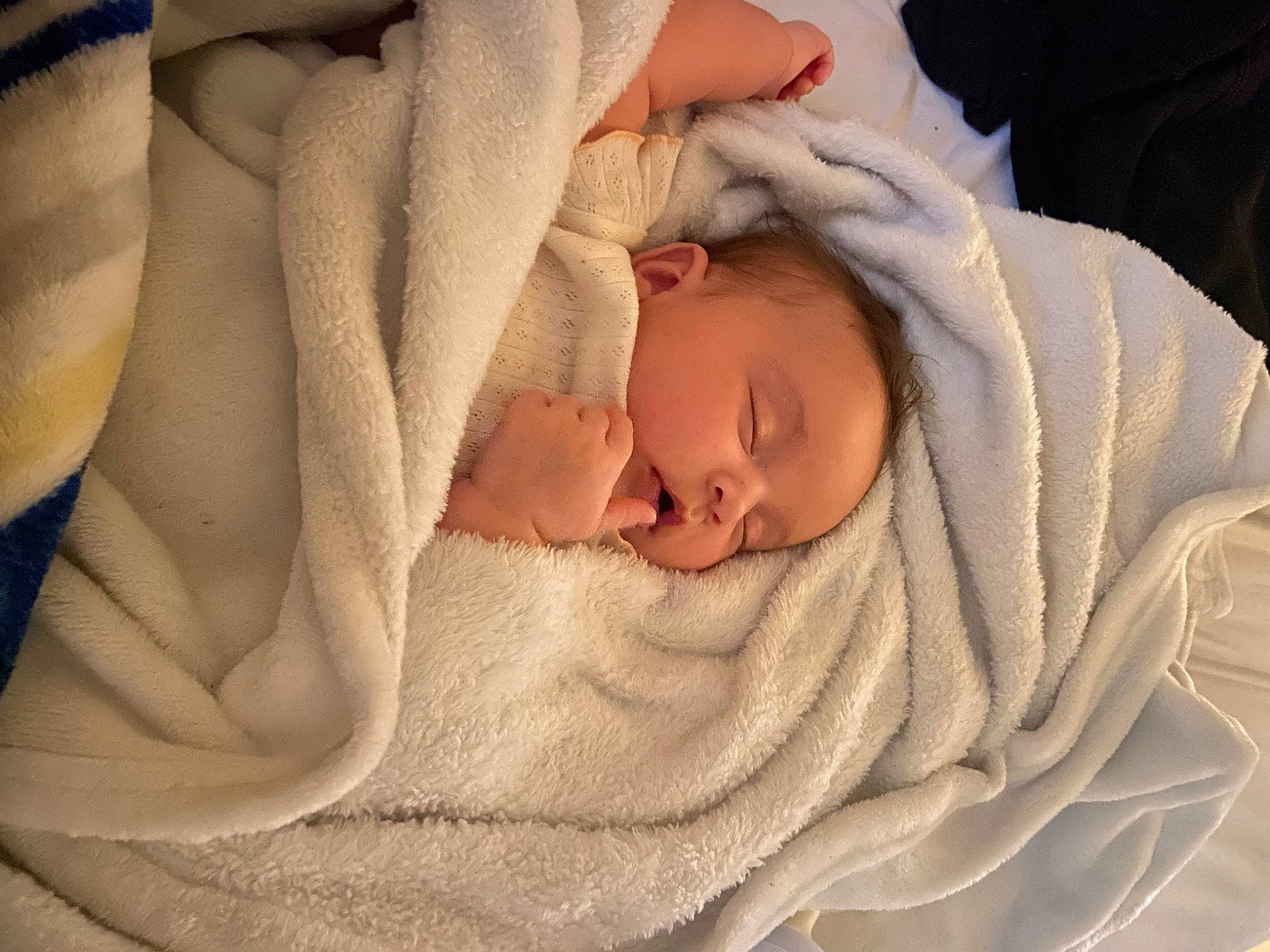 Adriana is registered to the contest to win money with this photo: baby, baby_products, baby_sleeping, baby_toddler_clothing, bedding, bedtime, blanket, carmine, cheek, child, comfort, face, head, linens, nap, person, room, sleep, textile, toddler