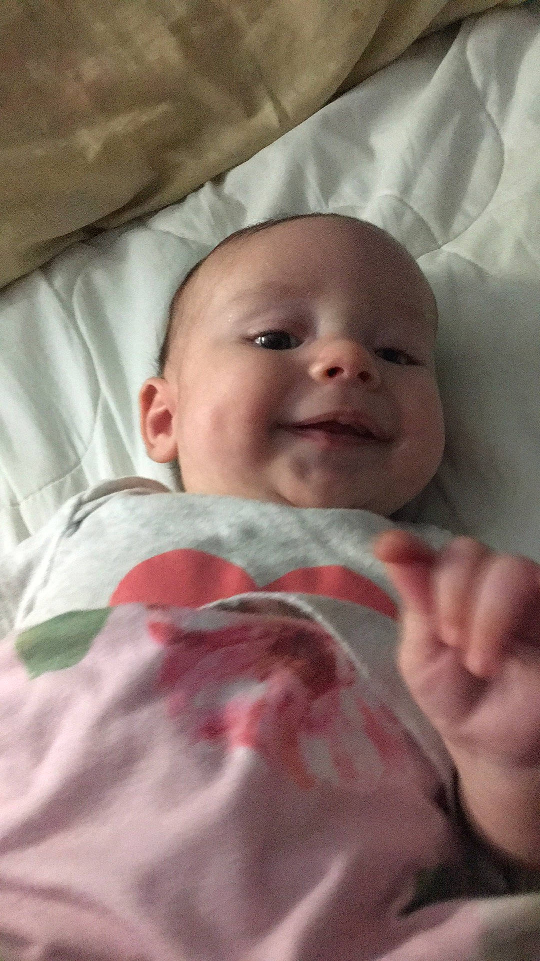 Melody is registered to the contest to win money with this photo: baby, cheek, child, chin, close_up, comfort, event, eyebrow, face, happy, head, iris, joy, linens, lip, mouth, person, pink, skin, smile