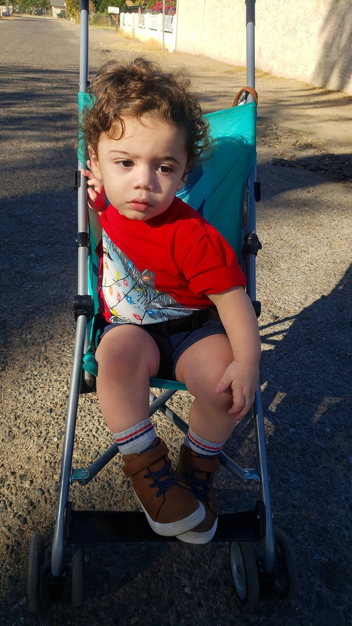 Aero is registered to the contest to win money with this photo: baby, baby_toddler_clothing, balance, child, child_model, electric_blue, foot, human_settlement, knee, lap, outdoor_play_equipment, outdoor_shoe, person, play, playground, public_space, shade, shadow, shoe, swing