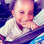 Brenynn joined the competition — help win amazing prizes! toddler, child, car_seat, smiling, happy, curly_hair, hand, seatbelt, car_interior, baby, person, portrait, young_child, cute, infant, clothing, safety, seat, closeup, joy