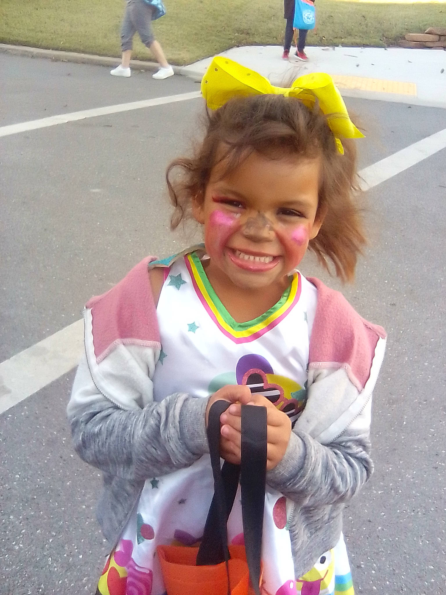 Lannessa joined the competition — help win amazing prizes! asphalt, child, costume, event, fun, gesture, glove, green, happy, headgear, holiday, joy, people, person, photograph, pink, recreation, smile, snapshot, toddler