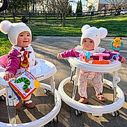 Skylie And Selina joined the competition — help win amazing prizes! baby, babies, walker, outdoor, sunny, grass, toy, hats, pom_pom, smiling, serious, concrete, trees, playtime, child, colorful, book, footwear, cute, nature