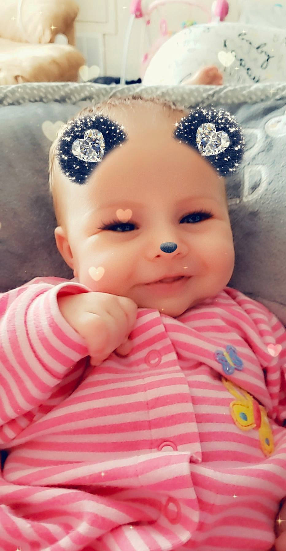 Jackie joined the competition — help win amazing prizes! baby, cheek, child, doll, face, forehead, hair_accessory, head, headgear, lip, nose, person, pink, skin, toddler, toy