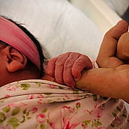 Rosaly Aleida Corzo joined the competition — help win amazing prizes! newborn, baby, hand, finger, adult, grip, pink_headband, floral_blanket, skin, sleeping, closeup, infant, tender_moment, human, bed, soft, cute, small, love, family