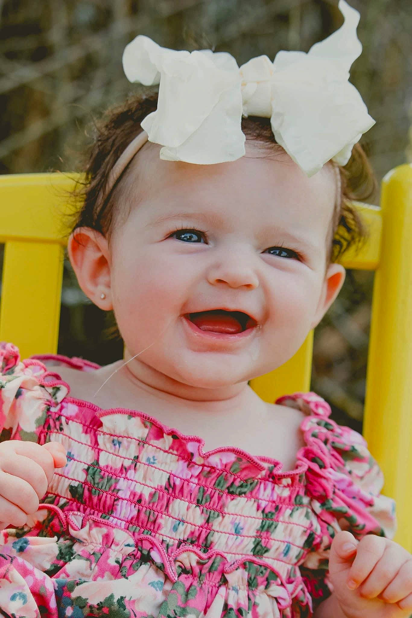 Haisleigh joined the competition — help win amazing prizes! baby, baby_toddler_clothing, cheek, child, chin, dress, facial_expression, fashion_accessory, fun, happy, hat, headband, iris, pattern, person, pink, skin, sleeve, smile, toddler
