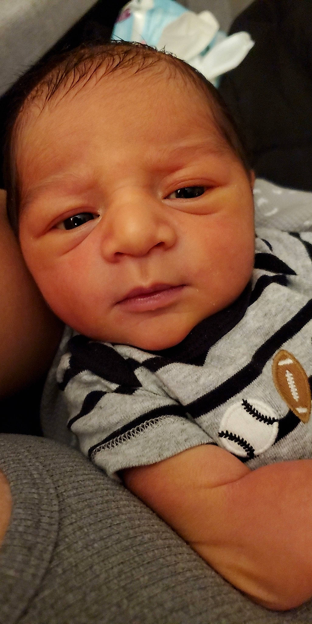 Kaleb is registered to the contest to win money with this photo: baby, baby_toddler_clothing, cheek, child, chin, close_up, comfort, ear, eyebrow, eyelash, finger, happy, iris, lip, mouth, neck, nose, person, skin, sleeve