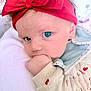 Alma a rejoint le concours — aidez-le/la à gagner de superbes lots ! baby, infant, blue_eyes, red_bow, headband, hand_in_mouth, cute, close_up, soft_blanket, cozy_clothing, heart_pattern, child, portrait, indoors, skin, face, newborn, person, young_child, expression