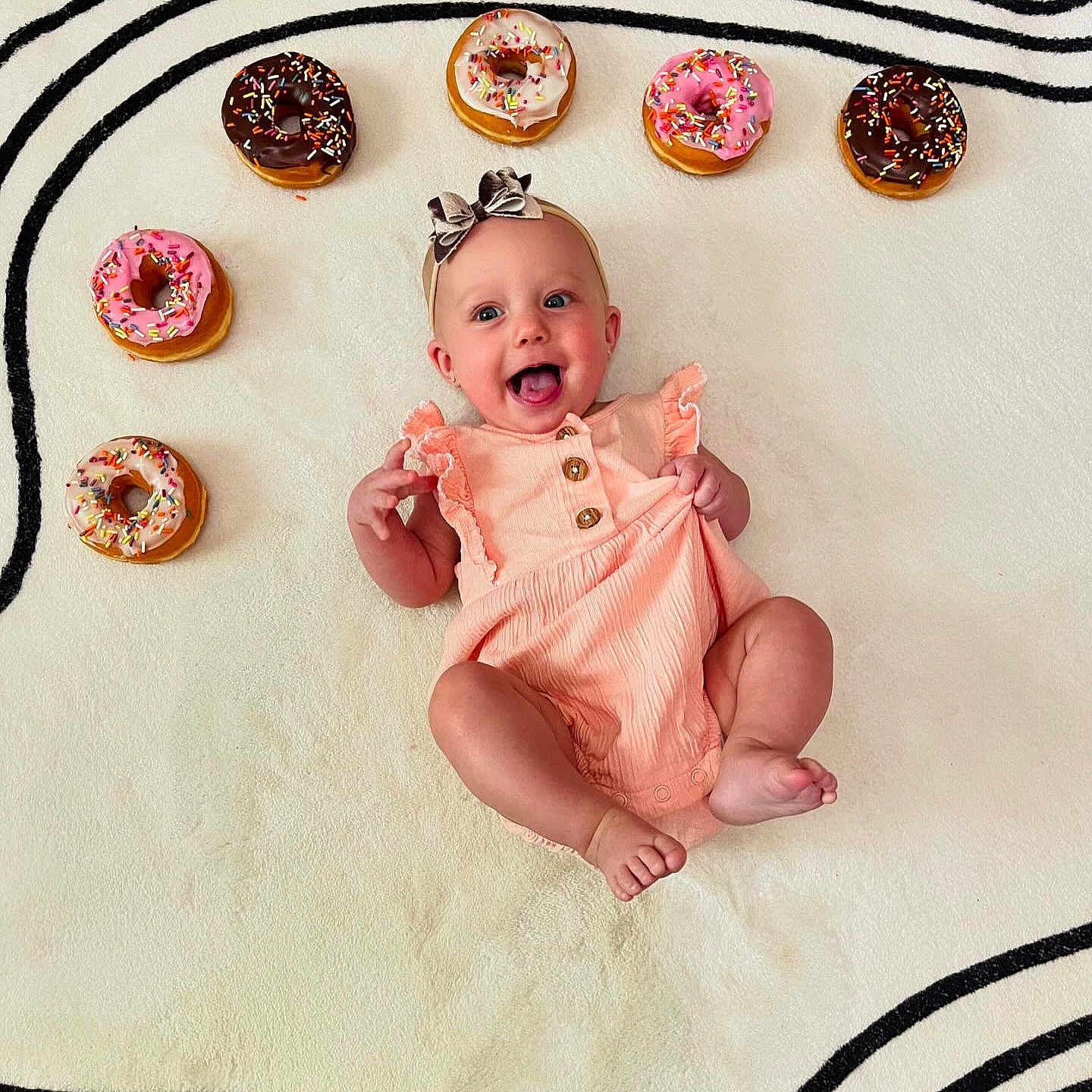 Blakely joined the competition — help win amazing prizes! accessories, baby, babylaughing, crown, face, happy, head, jewelry, locket, pendant, people, person, photography, portrait, sitting, yawning