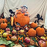 baby, child, pumpkin, pumpkin_costume, autumn, fall, apples, leaves, orange, headband, costume, portrait, indoor, seasonal, harvest, sitting, infant, baby_photography, decorations, smiling