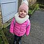 Léna a rejoint le concours — aidez-le/la à gagner de superbes lots ! child, kid, girl, toddler, pink_jacket, knit_hat, pompom, scarf, backpack, smile, boots, outdoor, sidewalk, door, stone_wall, winter_clothing, portrait, happy, standing, cold_weather