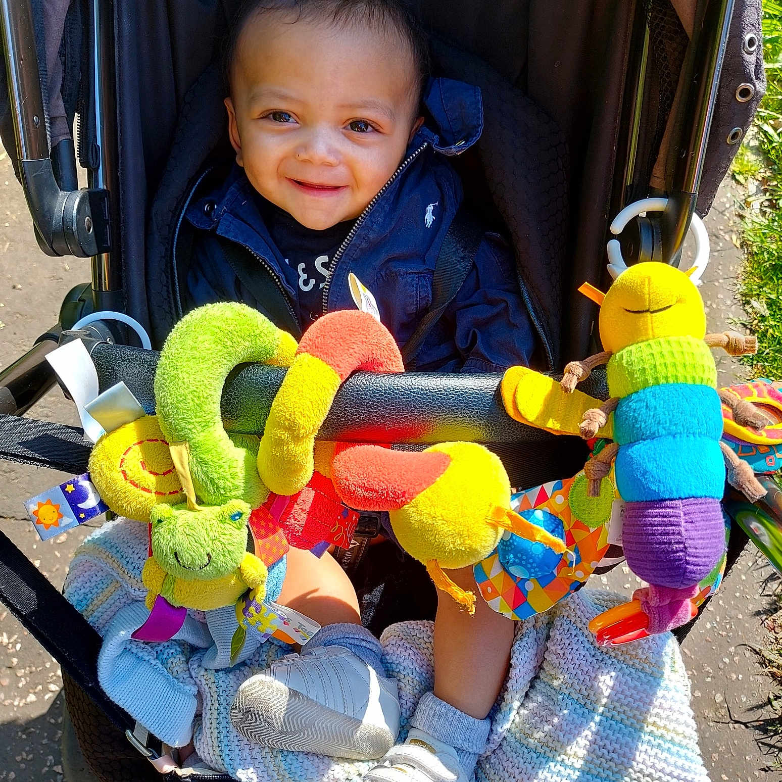 Levin joined the competition — help win amazing prizes! architecture, baby, buggy, building, clothing, face, footwear, hat, head, outdoors, person, photography, plush, portrait, shelter, shoe, stroller, toy, transportation, vehicle