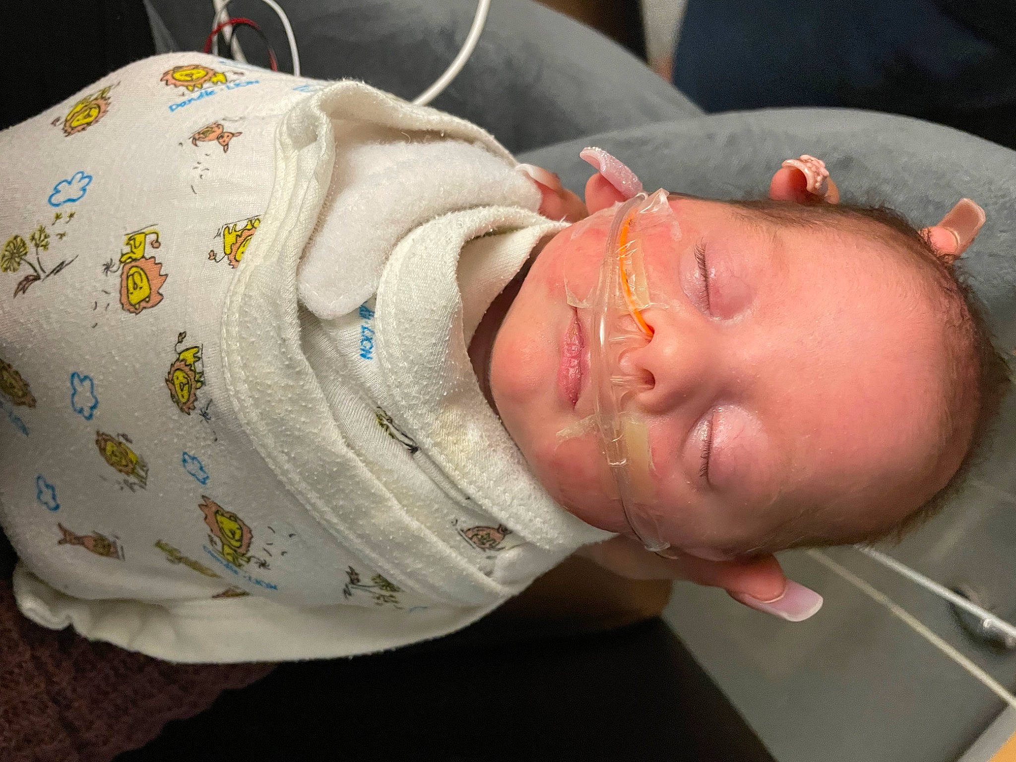 Scarlett is registered to the contest to win money with this photo: abdomen, baby, baby_products, chest, child, comfort, ear, elbow, eyelash, glasses, hat, headgear, mouth, neck, nose, person, personal_protective_equipment, room, skin, sunglasses