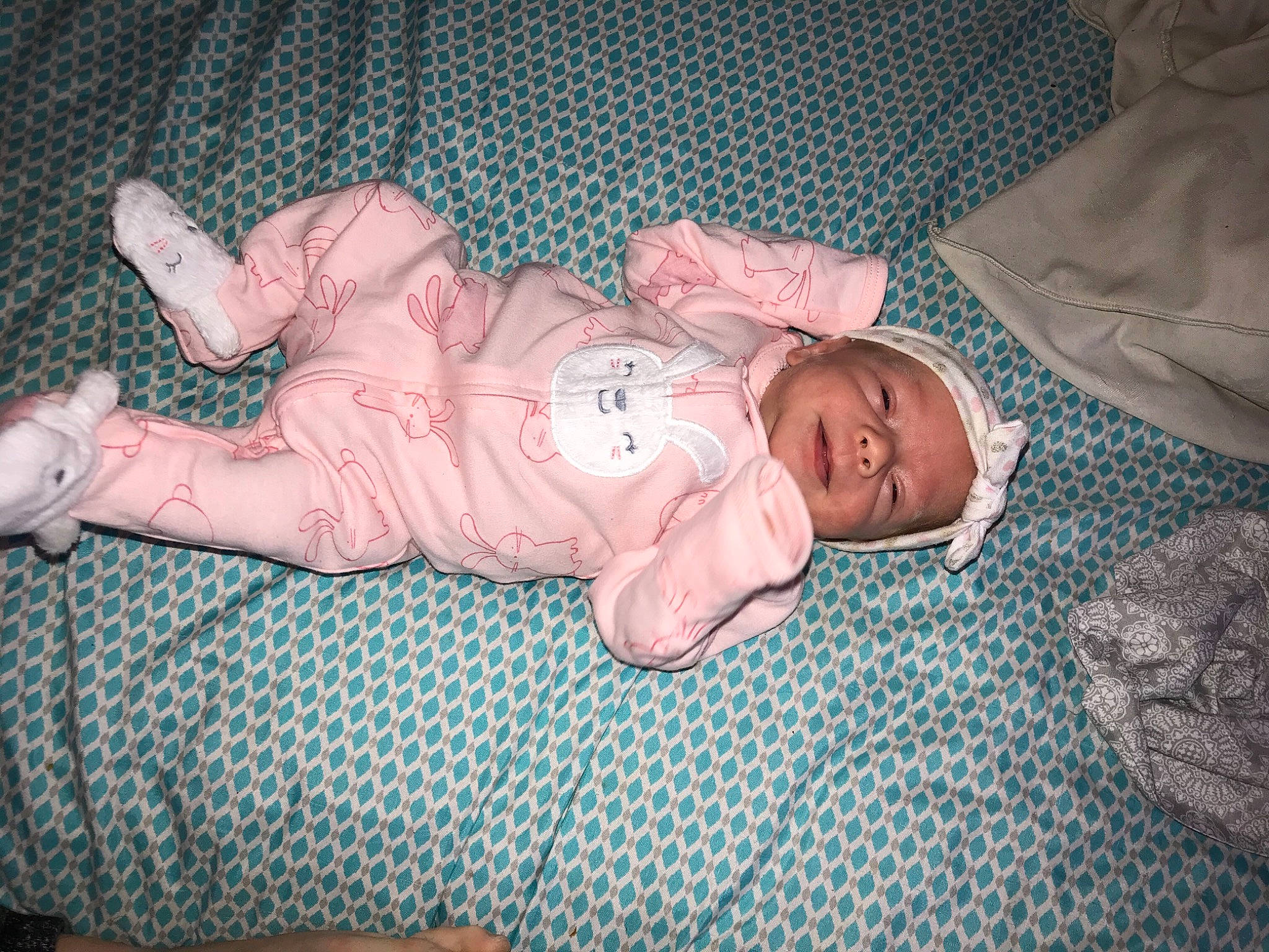 Miley joined the competition — help win amazing prizes! baby, baby_products, baby_toddler_clothing, bedding, bedtime, cheek, child, comfort, eye, grass, iris, linens, nap, pattern, person, room, sitting, skin, sleep, sleeve