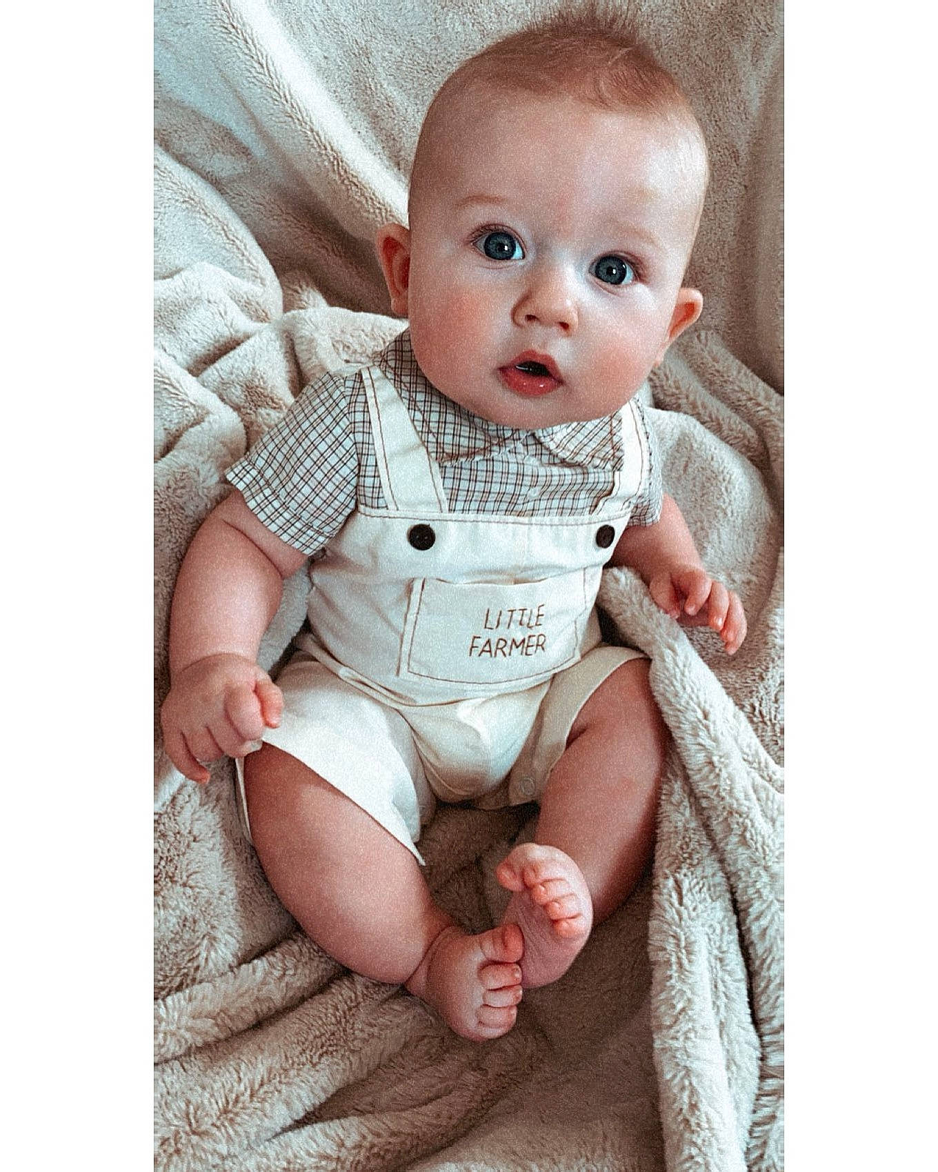 Colter joined the competition — help win amazing prizes! baby, baby_products, baby_toddler_clothing, cheek, child, comfort, eye, finger, flash_photography, grey, happy, iris, neck, person, portrait_photography, product, sitting, skin, sleeve, smile