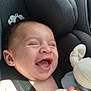 baby, car_seat, pacifier, toy, smiling, happy, child, infant, seatbelt, cute, portrait, indoors, closeup, joy, laughter, childhood, face, skin, hand, comfort