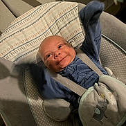 Quanzae joined the competition — help win amazing prizes! baby, infant, smile, blue_clothing, baby_seat, straps, blanket, cheerful, cute, indoors, cushion, baby_bouncer, happy, small_arms, head, face, newborn, soft_toys, cozy, child