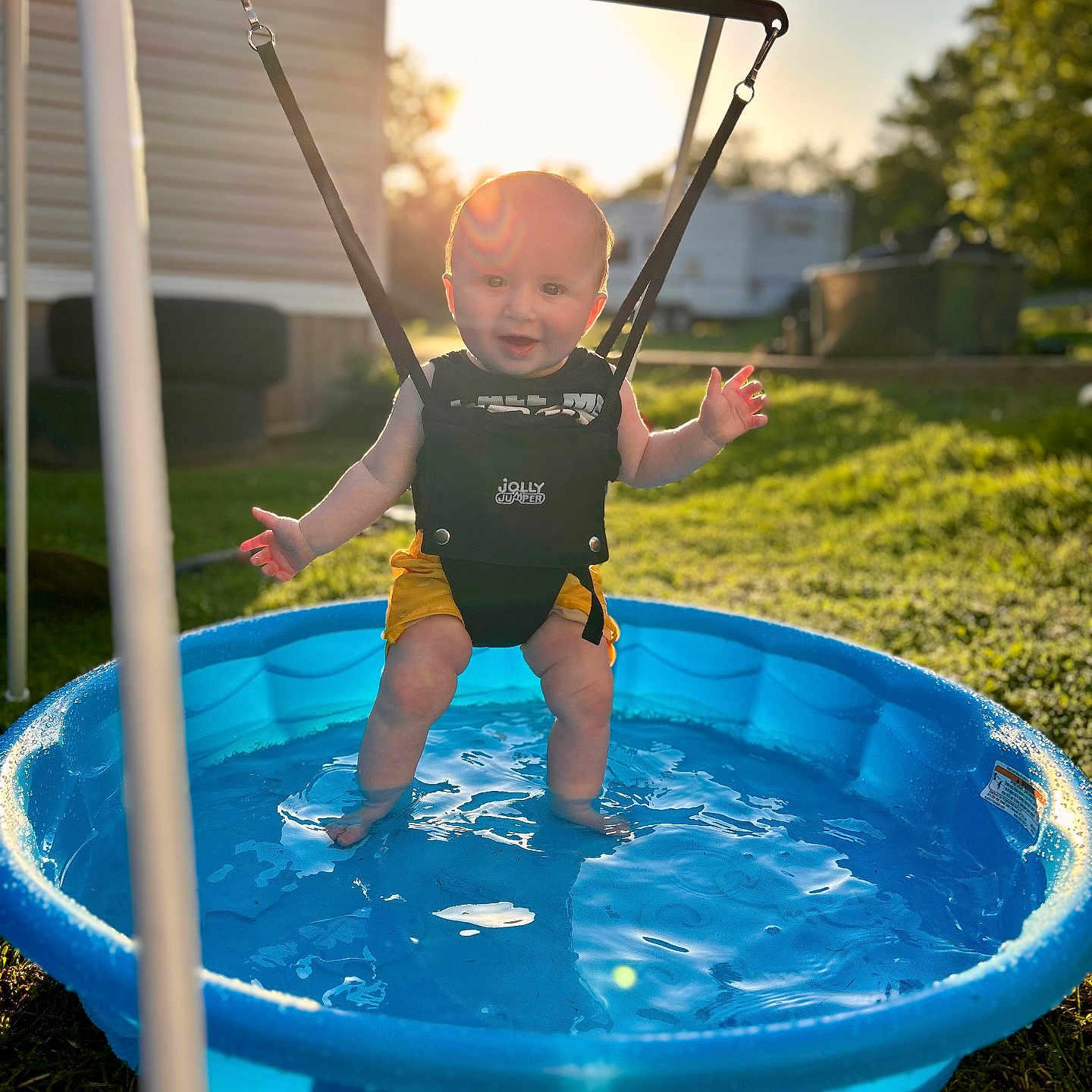 Court joined the competition — help win amazing prizes! baby, backlight, blue, child, fun, grass, happy, harness, outdoor, person, playtime, pool, reflection, smiling, summer, sunlight, sunset, swing, water, yellow