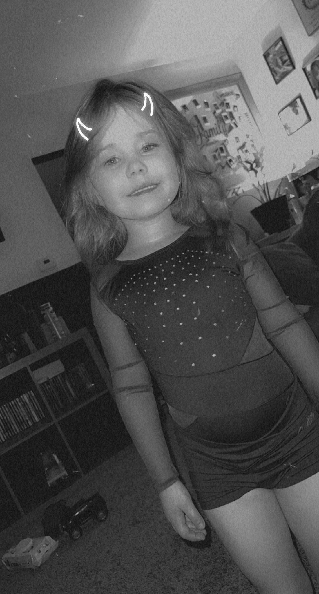 Davina joined the competition — help win amazing prizes! black, black_and_white, bookcase, cool, facial_expression, flash_photography, fun, hair, hairstyle, leg, organ, person, photograph, shorts, shoulder, smile, standing, style, thigh, waist