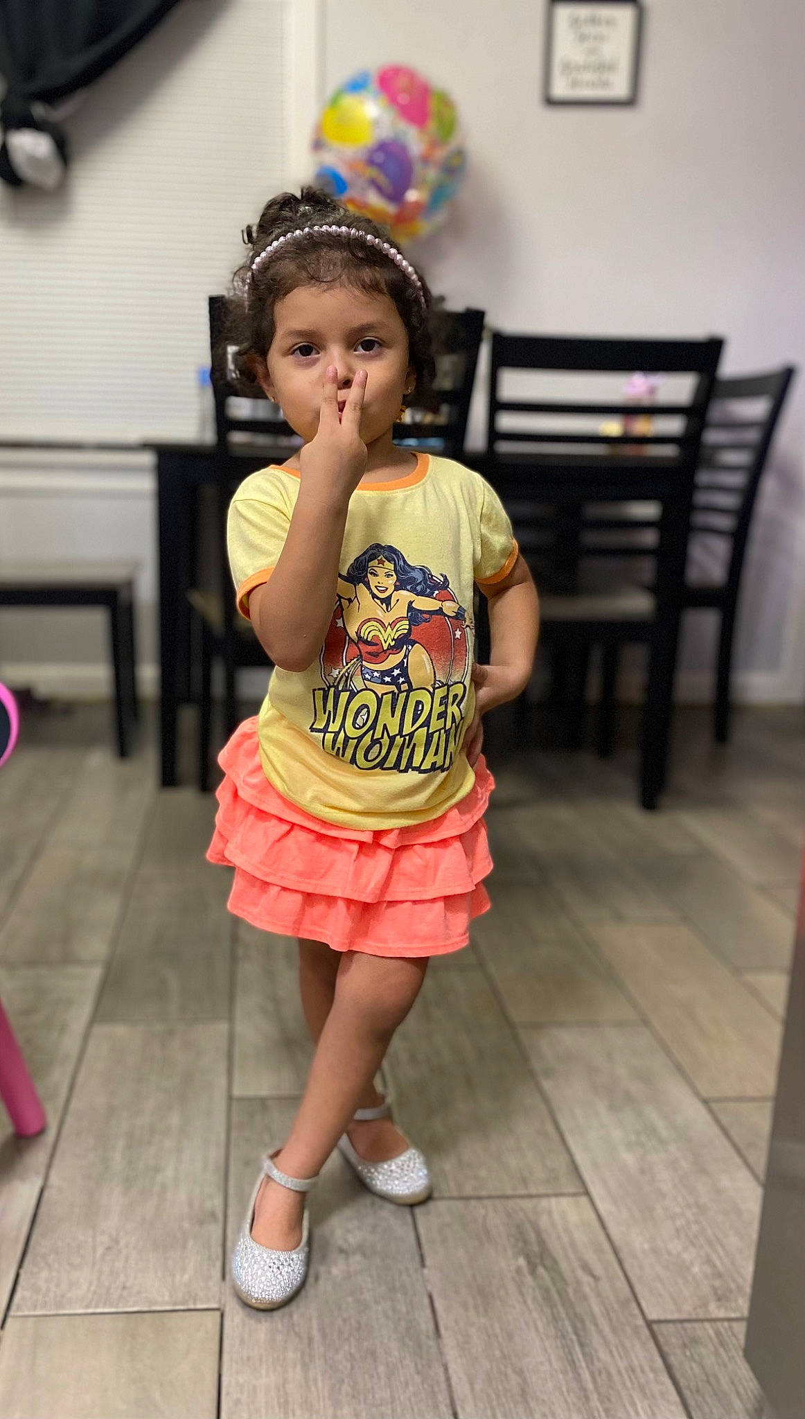 Alanna is registered to the contest to win money with this photo: chair, child, event, fashion_design, flip_flops, flooring, fun, happy, human_leg, leisure, magenta, party, person, room, sandal, sock, t_shirt, thigh, toddler, vacation