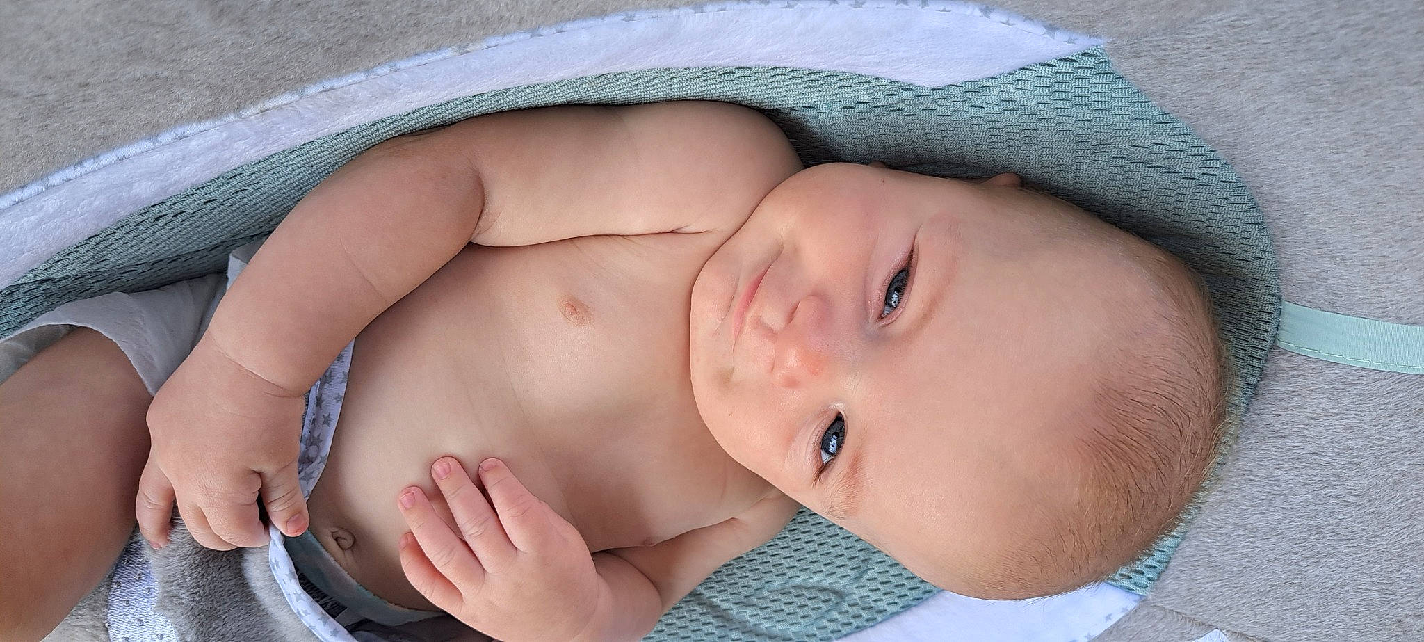 Dennis is registered to the contest to win money with this photo: abdomen, baby, baby_products, baby_sleeping, baby_toddler_clothing, cheek, chest, child, chin, close_up, comfort, eyelash, headgear, linens, lip, nose, pattern, person, skin, textile
