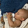 baby, bottle, feeding, towel, blanket, sleeping, child, hand, face, ear, skin, indoors, comfort, resting, cute, infant, young, peaceful, nap, soft