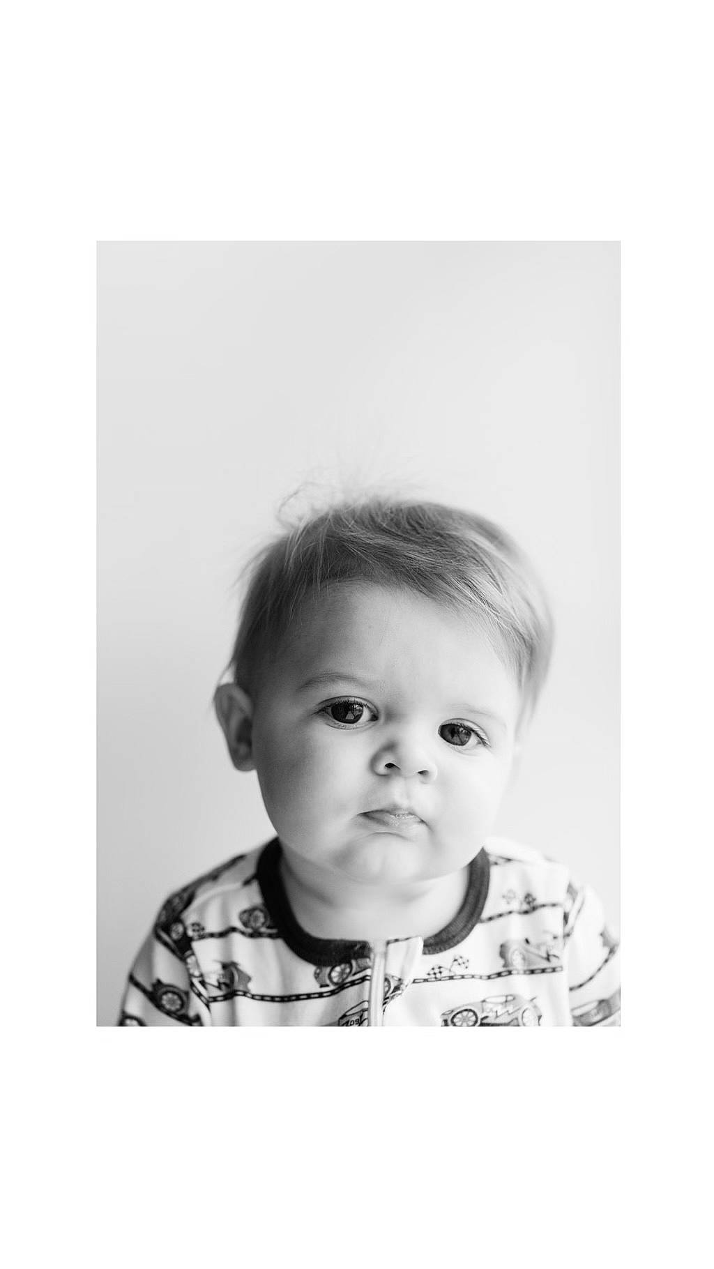 Colson joined the competition — help win amazing prizes! baby, baby_toddler_clothing, cheek, child, child_model, clothing, collar, eyebrow, eyelash, flash_photography, happy, monochrome, monochrome_photography, pattern, person, portrait, portrait_photography, sitting, sleeve, t_shirt