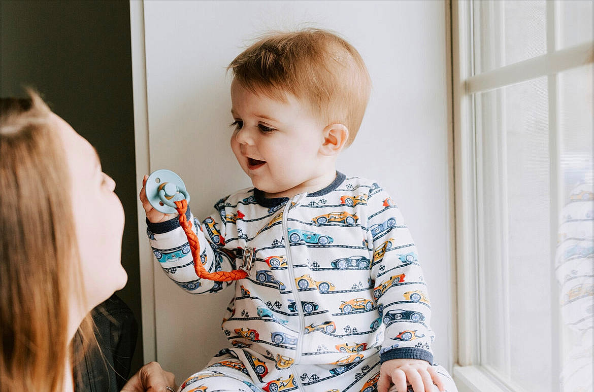 Colson is registered to the contest to win money with this photo: baby, baby_toddler_clothing, child, electric_blue, event, eyelash, face, facial_expression, fun, hairstyle, happy, pattern, person, product, sitting, skin, sleeve, smile, standing, t_shirt