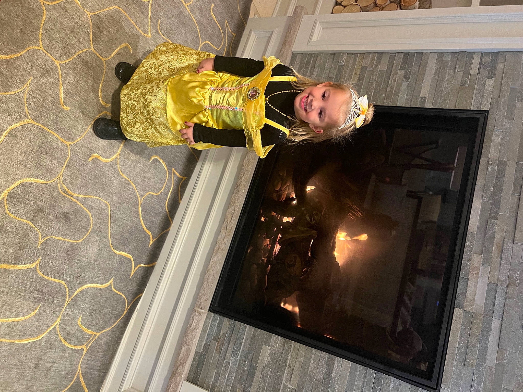 Maddalynn joined the competition — help win amazing prizes! flooring, gas, hardwood, hearth, heat, joy, pattern, person, rectangle, road_surface, room, shadow, visual_arts, wood