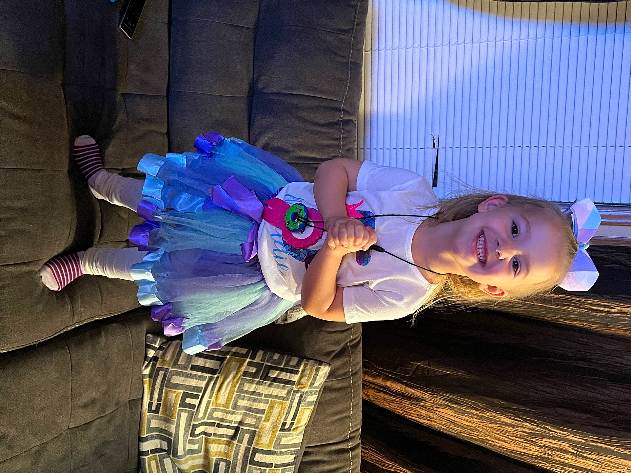 Maddalynn is registered to the contest to win money with this photo: child, costume, electric_blue, event, fun, happy, joy, magenta, person, pink, purple, textile, violet, wrist