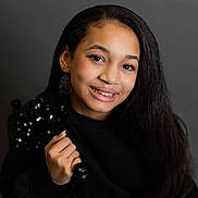 Brielle is registered to the contest to win money with this photo: adult, blackhair, bodypart, clothing, dimples, face, female, finger, hair, hand, happy, head, longsleeve, mouth, person, photography, portrait, sleeve, smile, woman