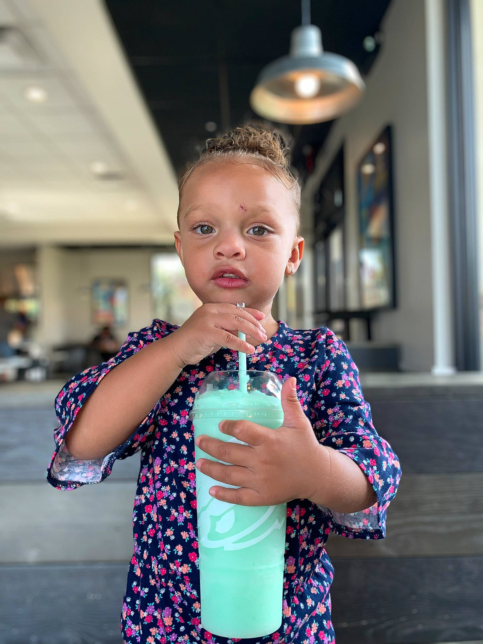 Zaela Jackson is registered to the contest to win money with this photo: child, drink, drinking, green, person, toddler, vacation, water