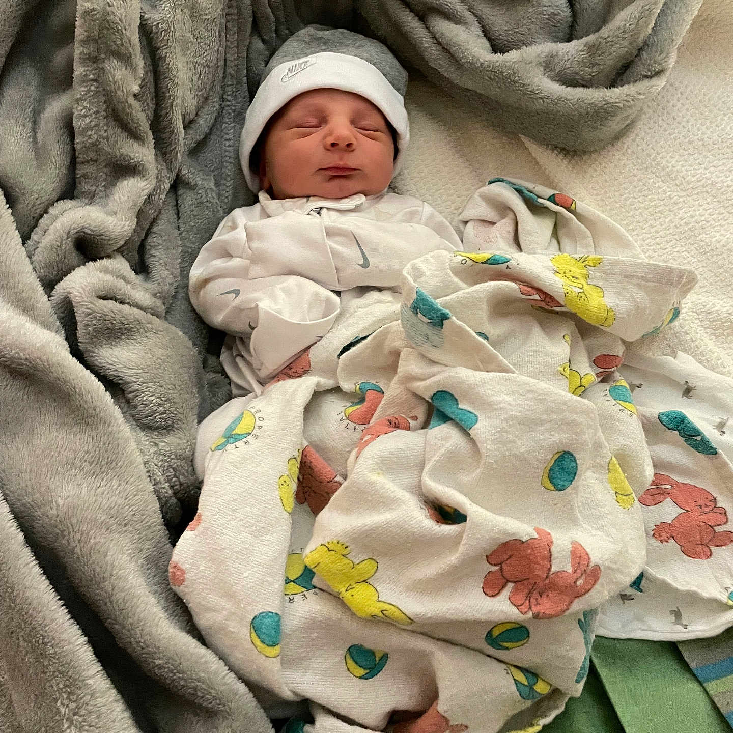 Lukas is registered to the contest to win money with this photo: newborn, baby, blanket, sleeping, hat, onesie, soft, cozy, plush, cloth, infant, cute, resting, wrapped, child, person, indoors, comfort, peaceful, sleep