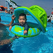 Sergio joined the competition — help win amazing prizes! baby, child, pool, water, inflatable, float, smile, happy, summer, outdoor, swimming, water_slide, canopy, people, swimwear, sunny, fun, recreation, parent, support