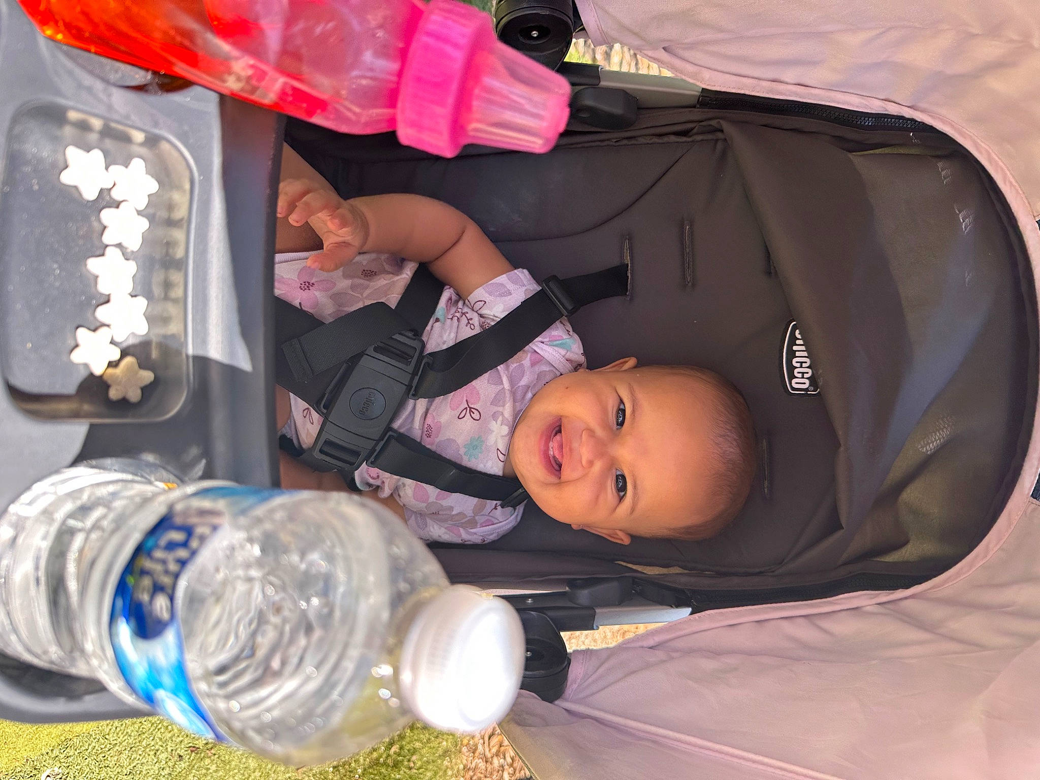 Kalani joined the competition — help win amazing prizes! automotive_design, automotive_lighting, bag, bottle, bottled_water, car_seat, comfort, distilled_water, drinking_water, drinkware, joy, luggage_and_bags, mineral_water, motor_vehicle, person, plastic_bottle, product, smile, toddler, vehicle_door