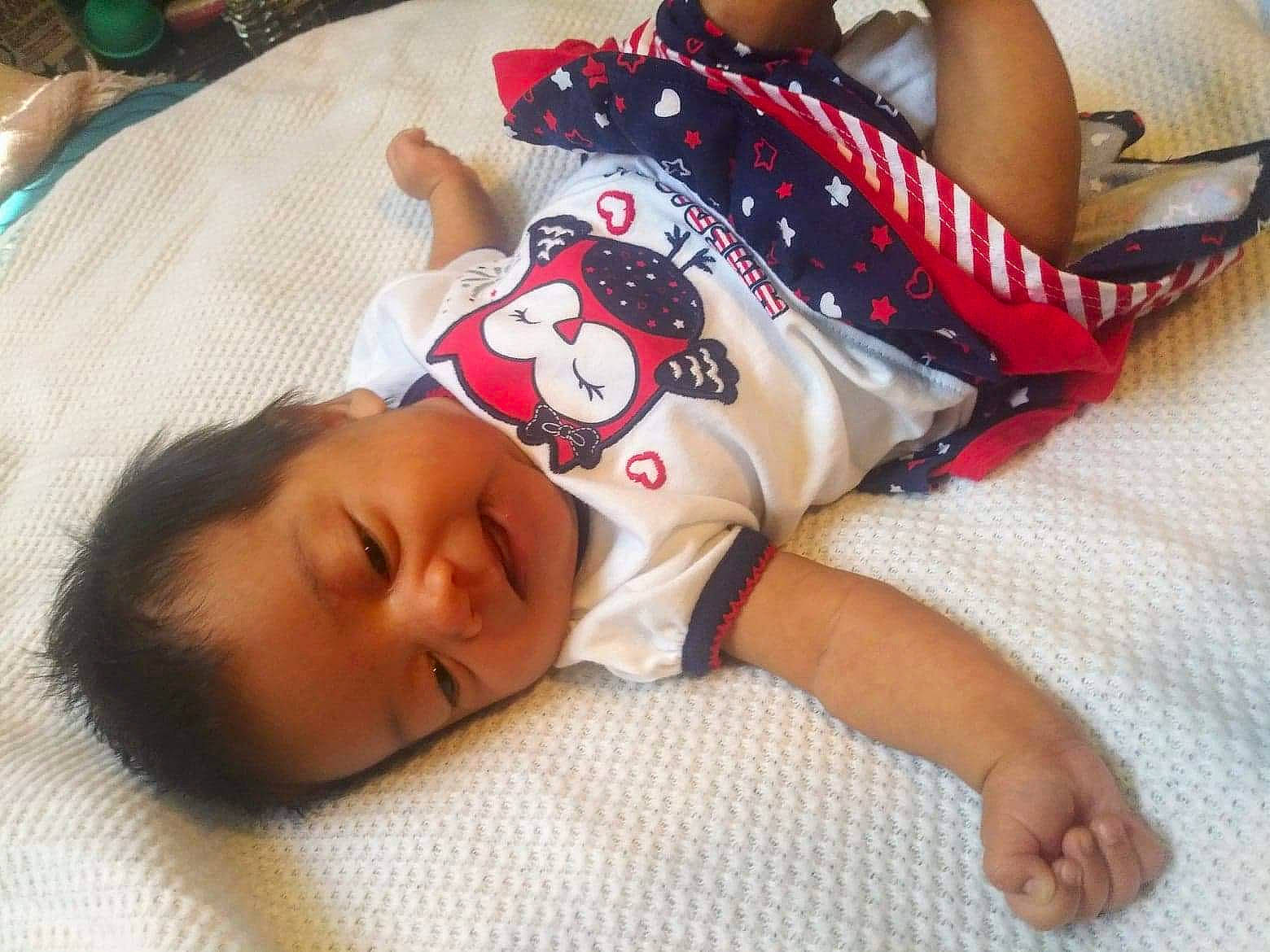 Nymeriah joined the competition — help win amazing prizes! baby, child, finger, hand, leg, nap, person, play, sleep, smile, toddler