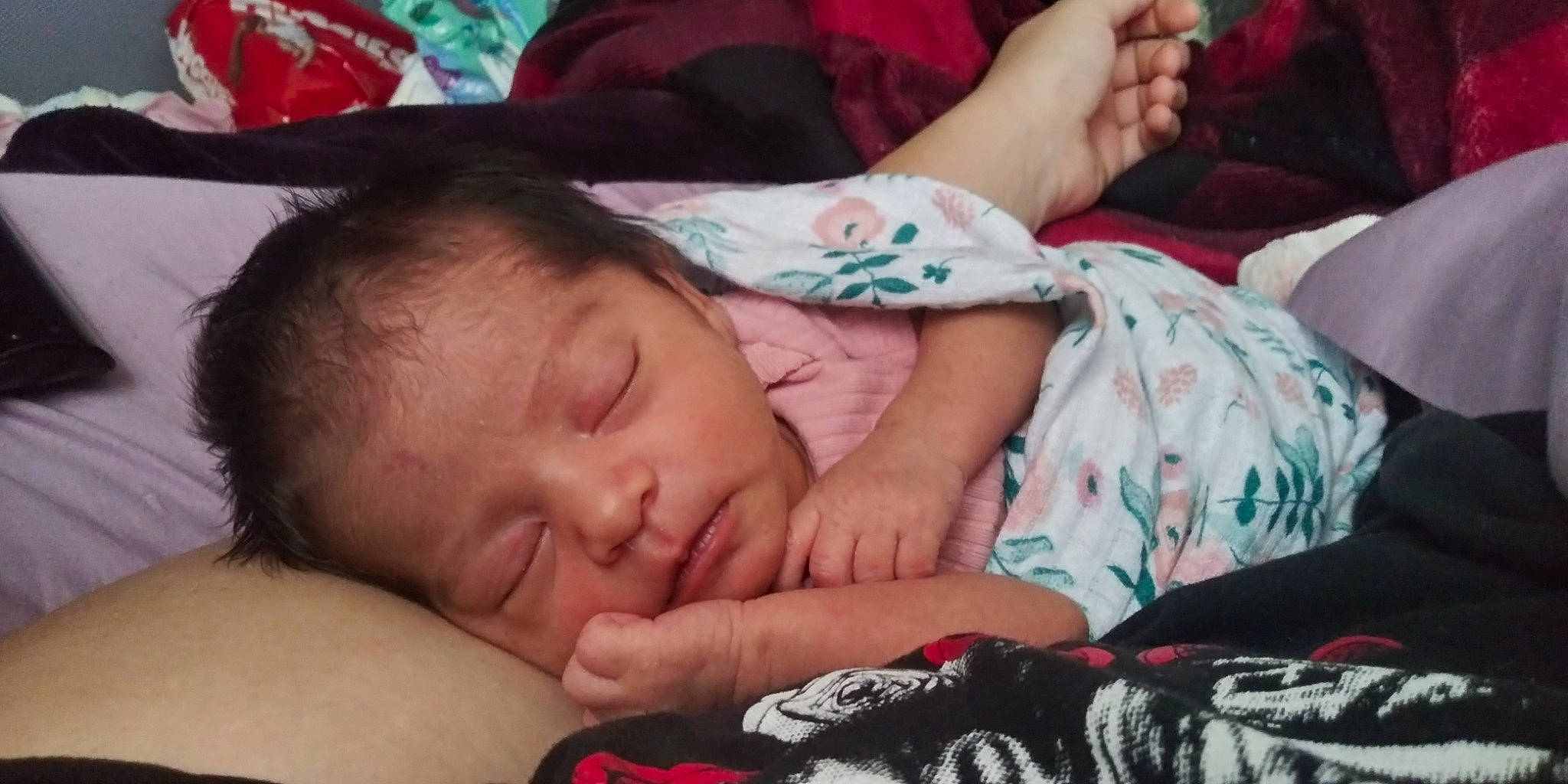 Nazaara is registered to the contest to win money with this photo: baby, bedtime, cheek, child, comfort, ear, eyelash, finger, gesture, hand, happy, head, iris, lip, mouth, nose, person, red, skin, textile