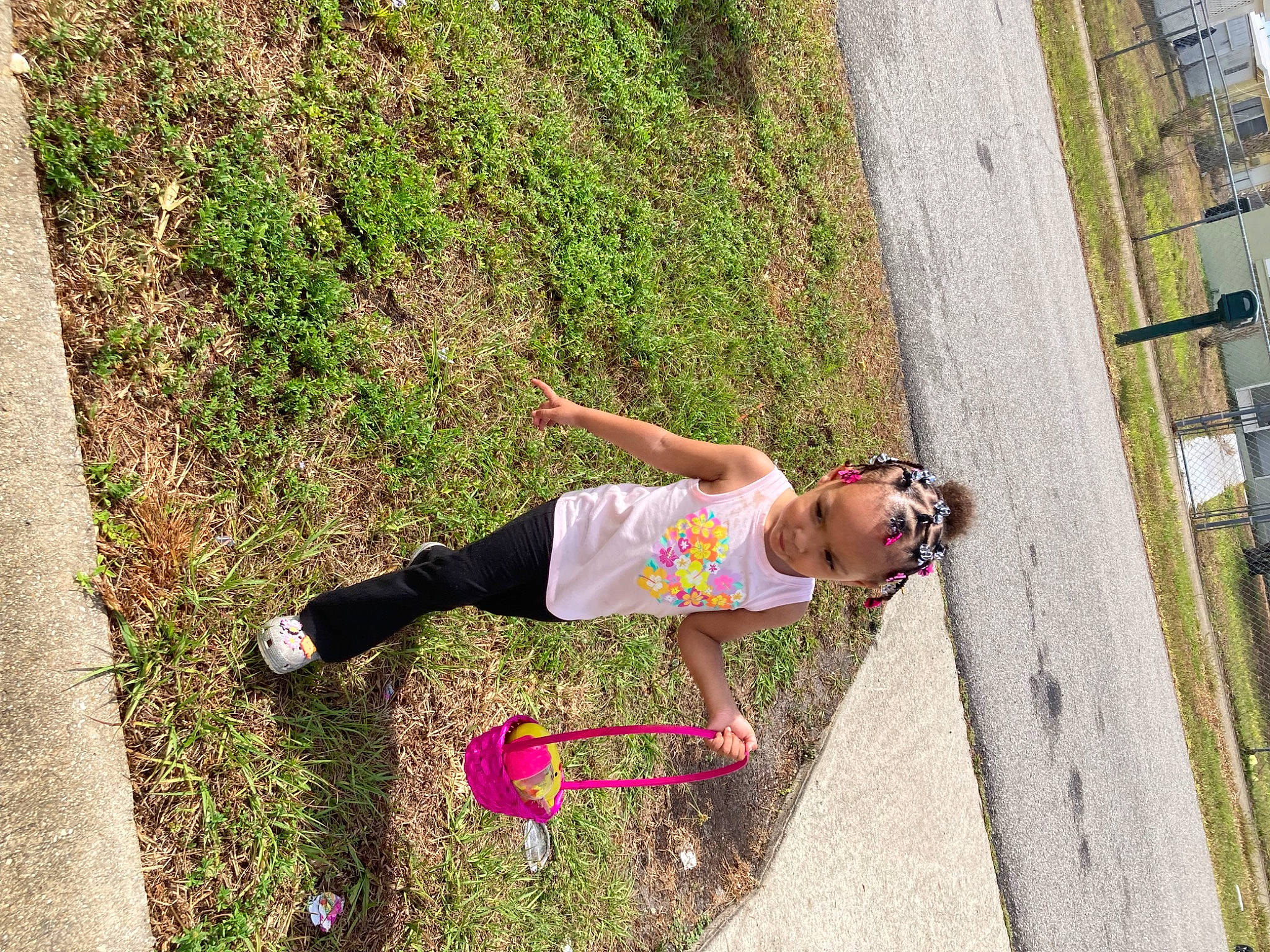 Aryanna joined the competition — help win amazing prizes! asphalt, child, footwear, fun, grass, leisure, pedestrian, people_in_nature, person, plant, play, recreation, road, road_surface, shadow, sidewalk, street, sunglasses, toddler, tree