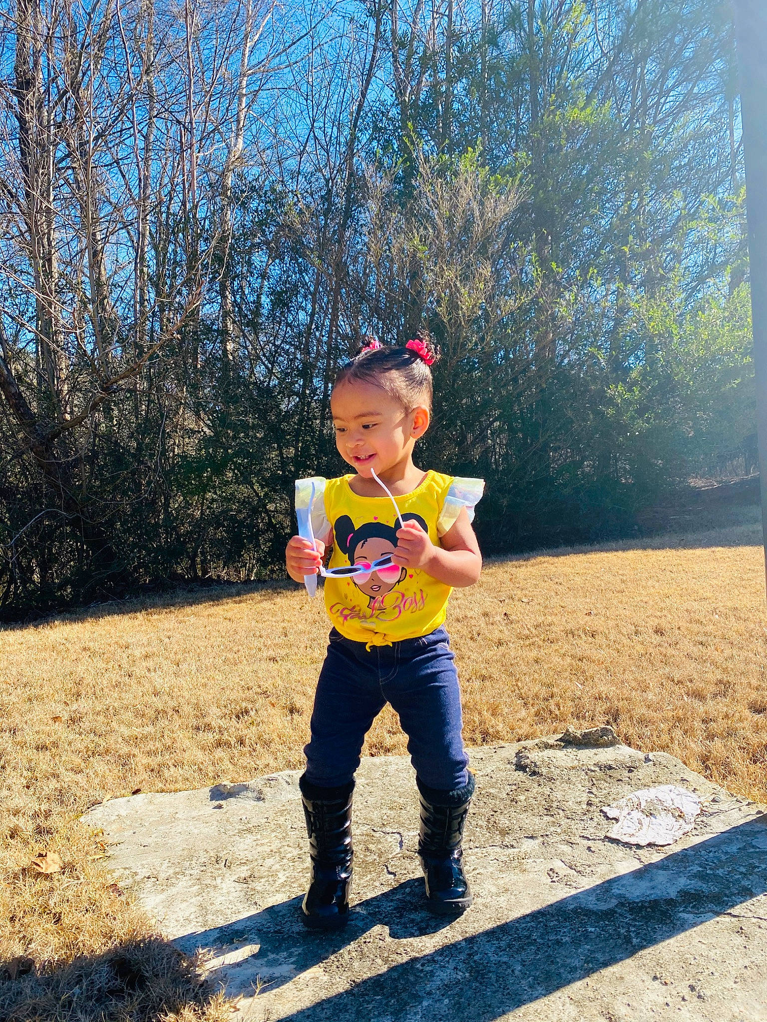 Dana is registered to the contest to win money with this photo: baby, car, child, cloud, happy, joy, mountain, people, person, play, recreation, sky, smile, soil, t_shirt, toddler, tree, vacation, vehicle, wilderness